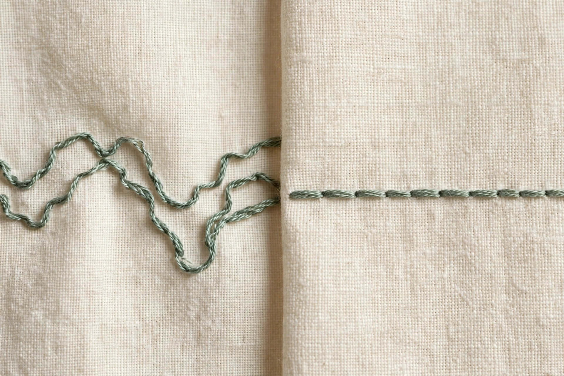 Photorealistic side-by-side comparison of wavy uneven stem stitch row and smooth even stem stitch row on cream linen, natural light, landscape orientation, no text